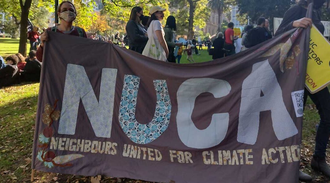 Maggie holding the NUCA banner